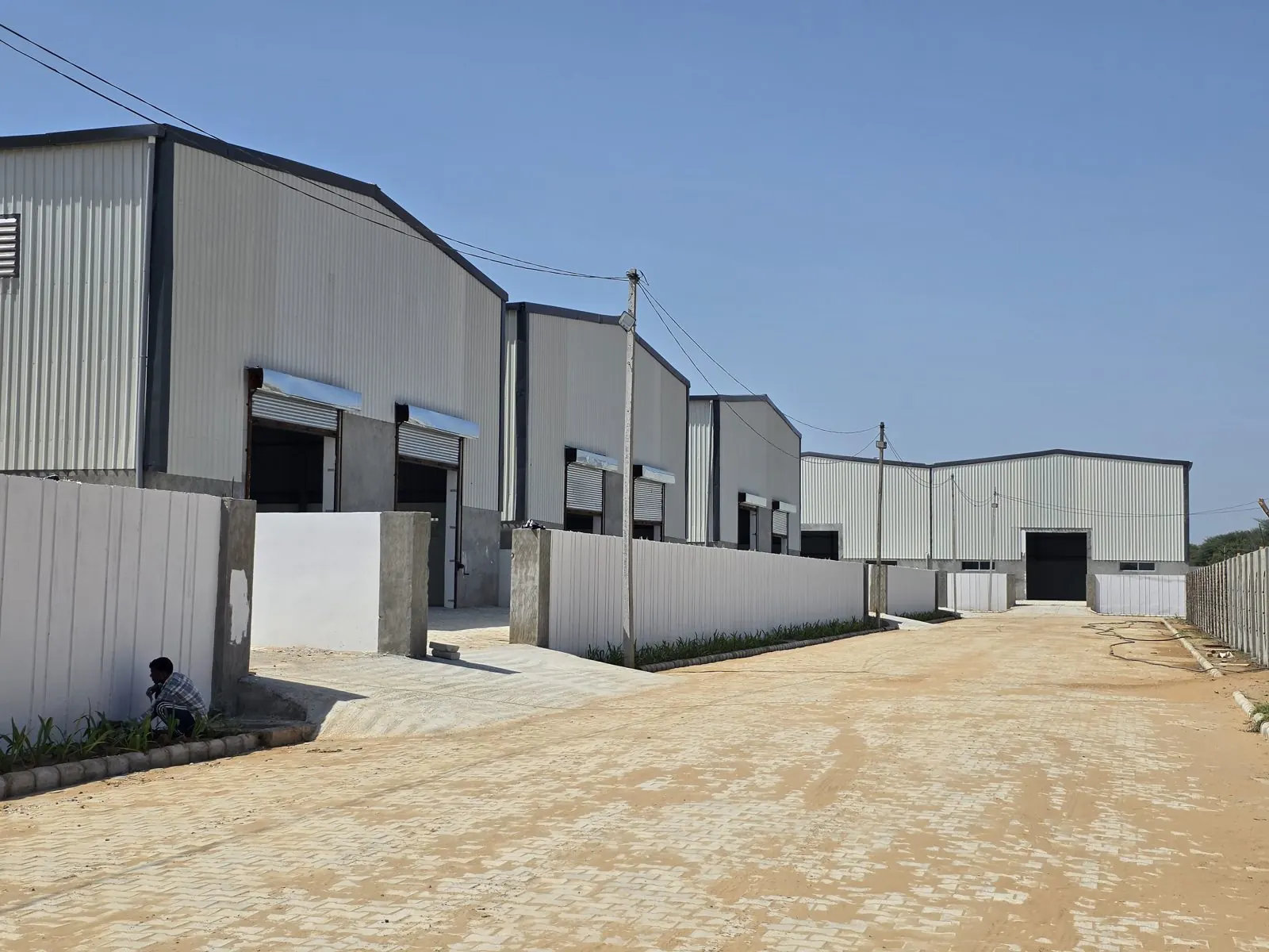 Orbit sheds and internal road